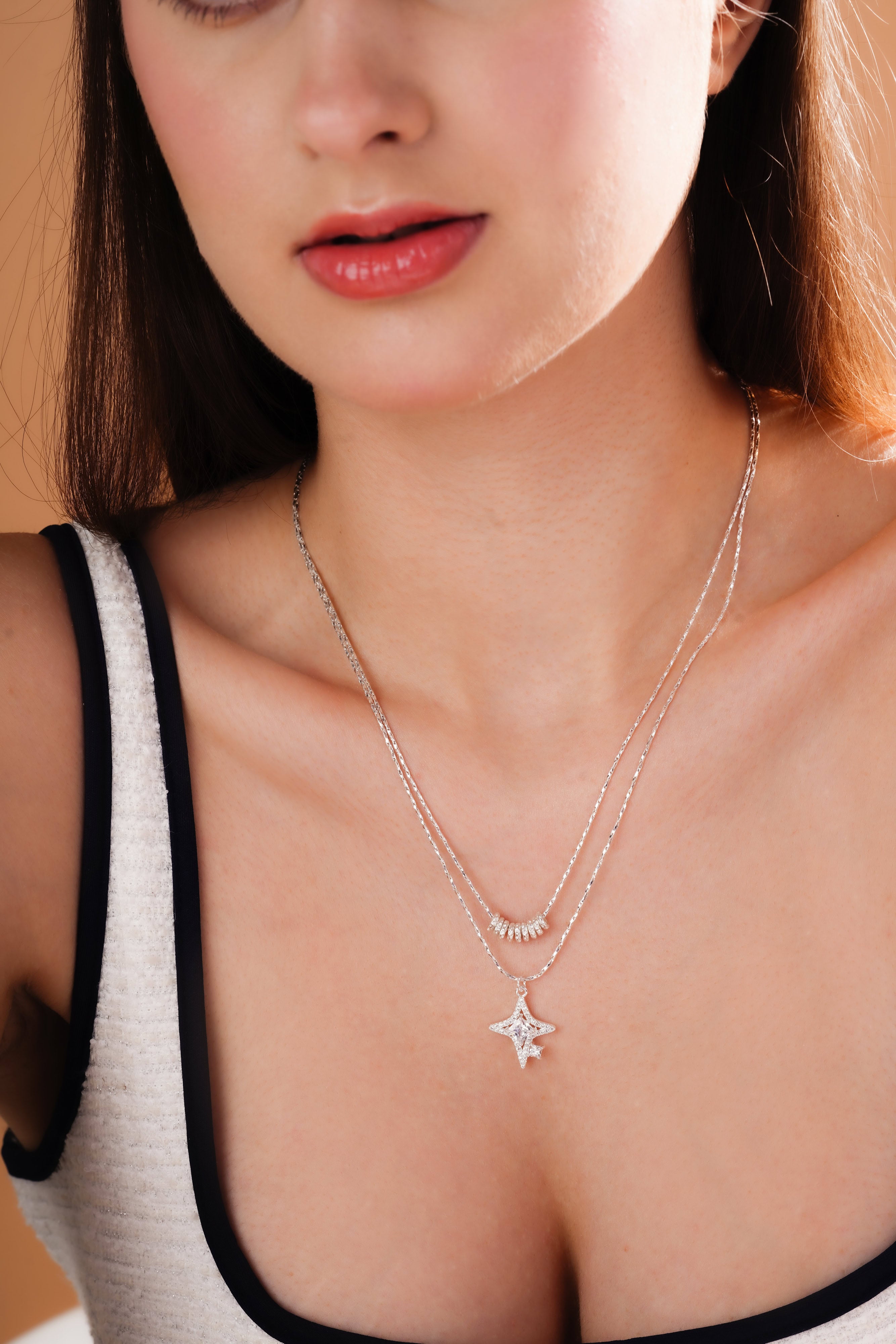 Layered Star Pendant Necklace with Curved Stone Accents